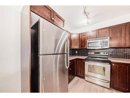 3205-60 Panatella Street Nw, Calgary, AB - Indoor Photo Showing Kitchen With Stainless Steel Kitchen