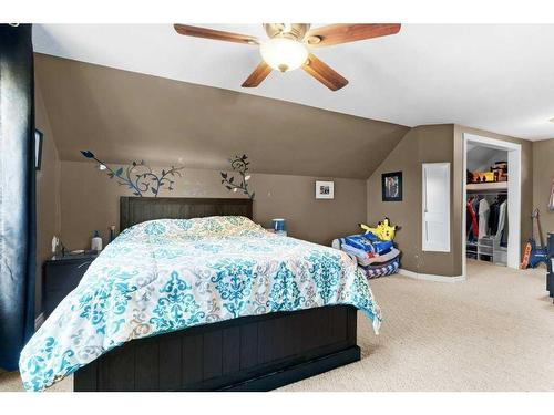 627 11 Avenue, Carstairs, AB - Indoor Photo Showing Bedroom