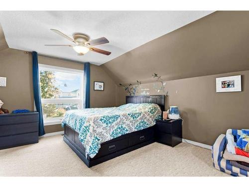 627 11 Avenue, Carstairs, AB - Indoor Photo Showing Bedroom