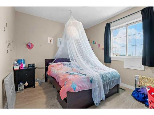 627 11 Avenue, Carstairs, AB - Indoor Photo Showing Bedroom