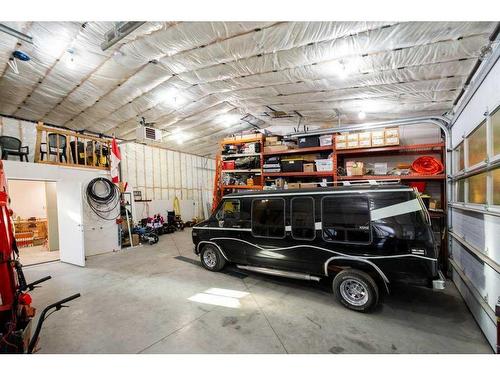 627 11 Avenue, Carstairs, AB - Indoor Photo Showing Garage