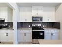 231 Cornerbrook Road Ne, Calgary, AB  - Indoor Photo Showing Kitchen 