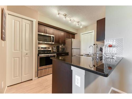 2332-81 Legacy Boulevard Se, Calgary, AB - Indoor Photo Showing Kitchen With Double Sink