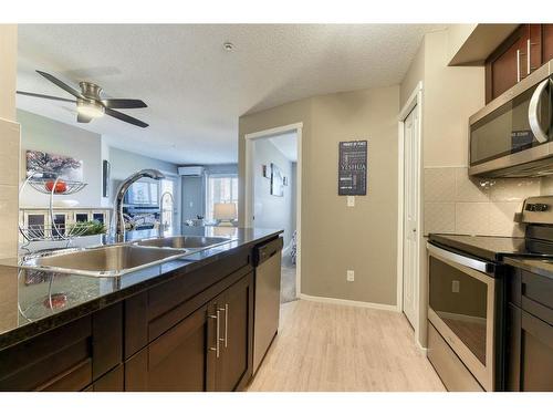 2332-81 Legacy Boulevard Se, Calgary, AB - Indoor Photo Showing Kitchen With Double Sink