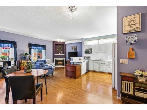 427-8535 Bonaventure Drive Se, Calgary, AB - Indoor With Fireplace