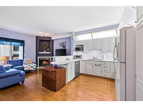 427-8535 Bonaventure Drive Se, Calgary, AB - Indoor With Fireplace