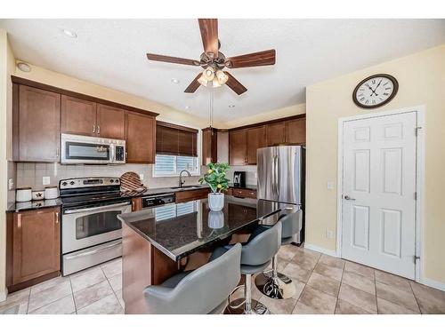 158 Windridge Road Sw, Airdrie, AB - Indoor Photo Showing Kitchen With Stainless Steel Kitchen