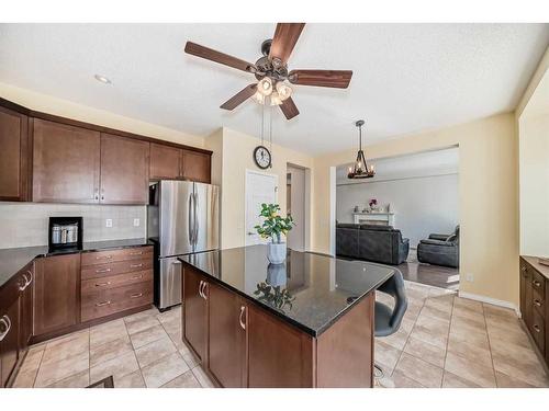 158 Windridge Road Sw, Airdrie, AB - Indoor Photo Showing Kitchen With Stainless Steel Kitchen