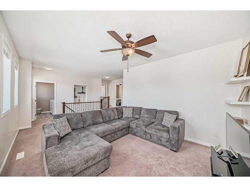 158 Windridge Road Sw, Airdrie, AB - Indoor Photo Showing Living Room