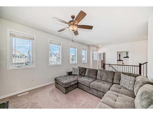 158 Windridge Road Sw, Airdrie, AB - Indoor Photo Showing Living Room