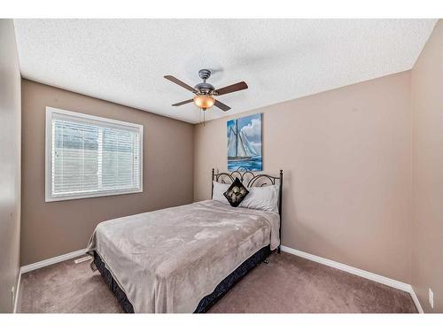 158 Windridge Road Sw, Airdrie, AB - Indoor Photo Showing Bedroom