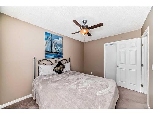 158 Windridge Road Sw, Airdrie, AB - Indoor Photo Showing Bedroom