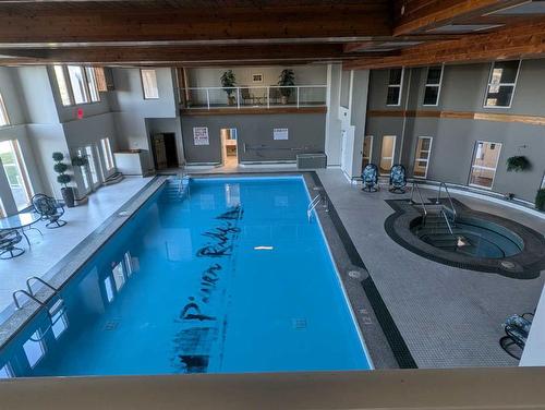 331-100 2 Avenue South, Lethbridge, AB - Indoor Photo Showing Other Room With In Ground Pool