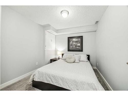 82 New Brighton Green Se, Calgary, AB - Indoor Photo Showing Bedroom