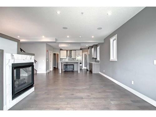 317 15 Avenue Ne, Calgary, AB - Indoor Photo Showing Living Room With Fireplace