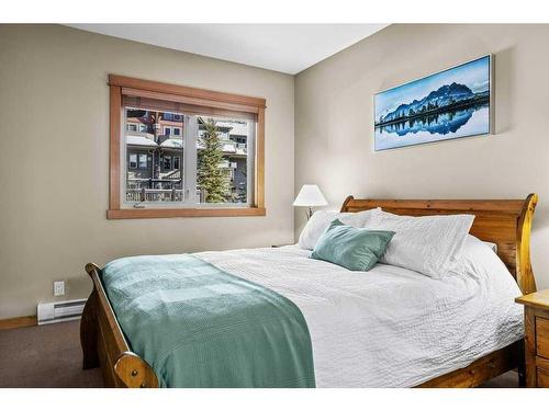 204-107 Montane Road, Canmore, AB - Indoor Photo Showing Bedroom