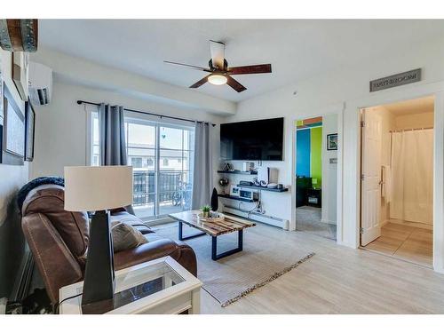 7403-151 Legacy Main Street Se, Calgary, AB - Indoor Photo Showing Living Room