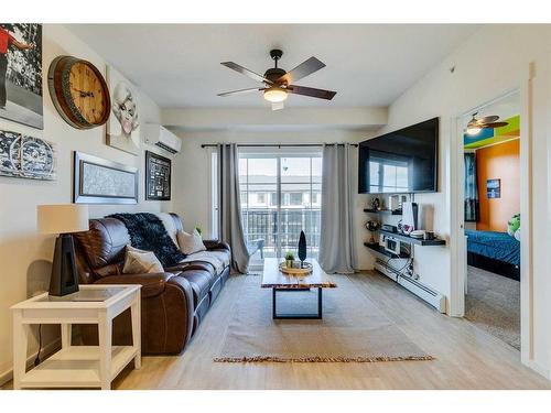 7403-151 Legacy Main Street Se, Calgary, AB - Indoor Photo Showing Living Room