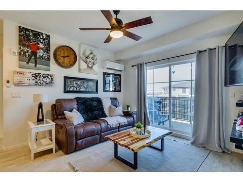 7403-151 Legacy Main Street Se, Calgary, AB - Indoor Photo Showing Living Room