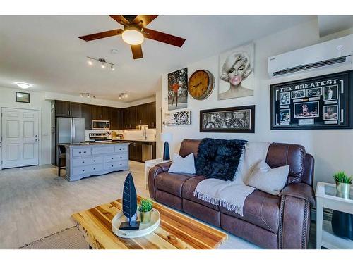 7403-151 Legacy Main Street Se, Calgary, AB - Indoor Photo Showing Living Room