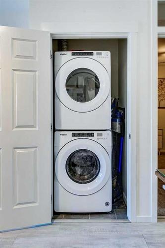 7403-151 Legacy Main Street Se, Calgary, AB - Indoor Photo Showing Laundry Room