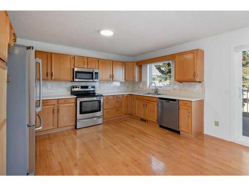 120 Norquay Heights Nw, Calgary, AB - Indoor Photo Showing Kitchen With Double Sink