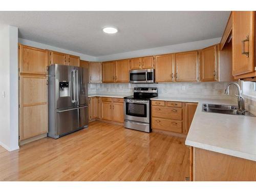 120 Norquay Heights Nw, Calgary, AB - Indoor Photo Showing Kitchen With Double Sink