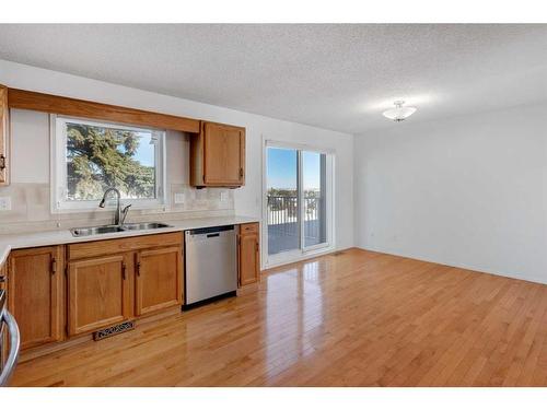 120 Norquay Heights Nw, Calgary, AB - Indoor Photo Showing Kitchen With Double Sink