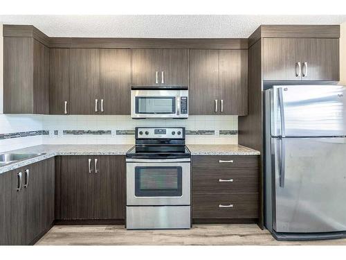 74 Auburn Bay Link Se, Calgary, AB - Indoor Photo Showing Kitchen