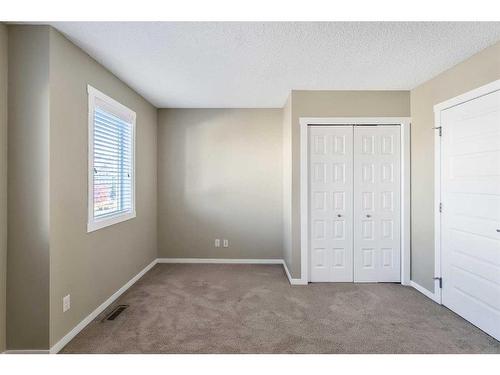 74 Auburn Bay Link Se, Calgary, AB - Indoor Photo Showing Other Room