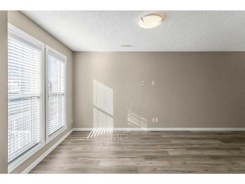 74 Auburn Bay Link Se, Calgary, AB - Indoor Photo Showing Other Room