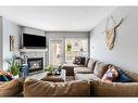 607-114 15 Avenue Sw, Calgary, AB  - Indoor Photo Showing Living Room With Fireplace 