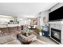 607-114 15 Avenue Sw, Calgary, AB  - Indoor Photo Showing Living Room With Fireplace 