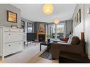 8205-315 Southampton Drive Sw, Calgary, AB  - Indoor Photo Showing Living Room With Fireplace 