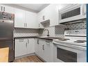 8205-315 Southampton Drive Sw, Calgary, AB  - Indoor Photo Showing Kitchen 