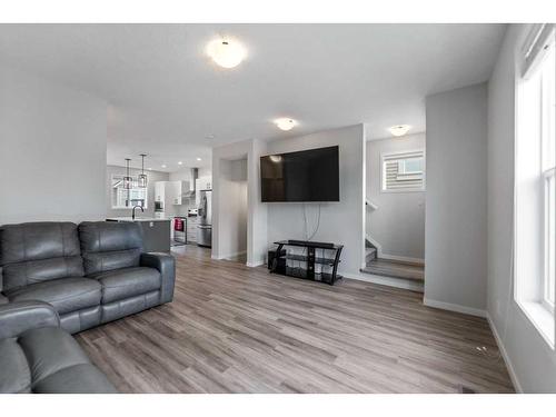 211 South Point Park Sw, Airdrie, AB - Indoor Photo Showing Living Room