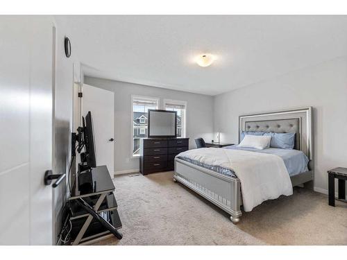 211 South Point Park Sw, Airdrie, AB - Indoor Photo Showing Bedroom