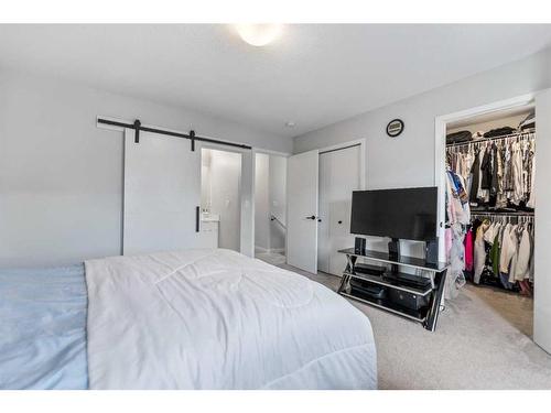 211 South Point Park Sw, Airdrie, AB - Indoor Photo Showing Bedroom