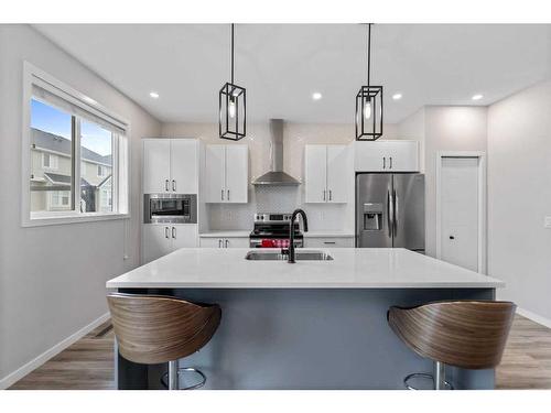 211 South Point Park Sw, Airdrie, AB - Indoor Photo Showing Kitchen With Stainless Steel Kitchen With Upgraded Kitchen