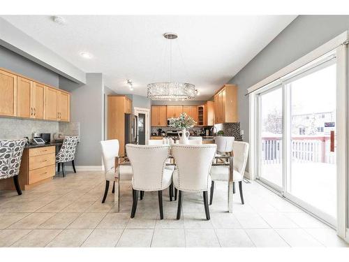 115 Railway Crescent Se, Langdon, AB - Indoor Photo Showing Dining Room