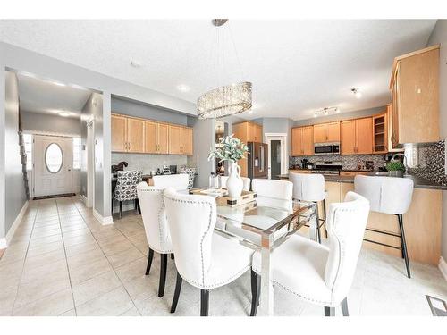 115 Railway Crescent Se, Langdon, AB - Indoor Photo Showing Dining Room