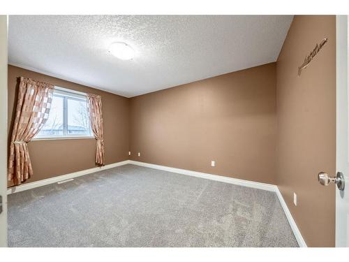 115 Railway Crescent Se, Langdon, AB - Indoor Photo Showing Other Room