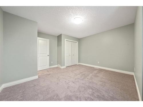 115 Railway Crescent Se, Langdon, AB - Indoor Photo Showing Other Room