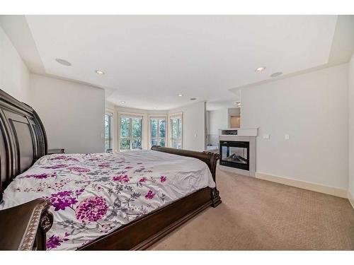 4 Rockcliff Point Nw, Calgary, AB - Indoor Photo Showing Bedroom