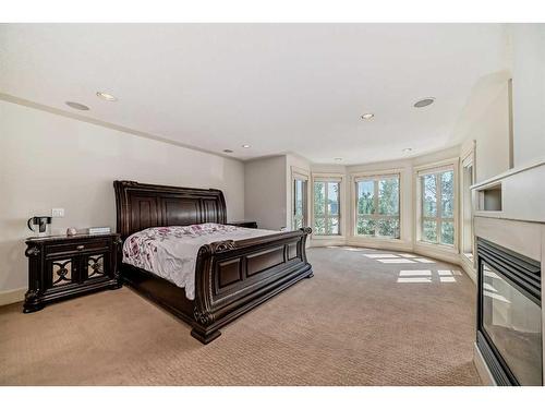 4 Rockcliff Point Nw, Calgary, AB - Indoor Photo Showing Bedroom