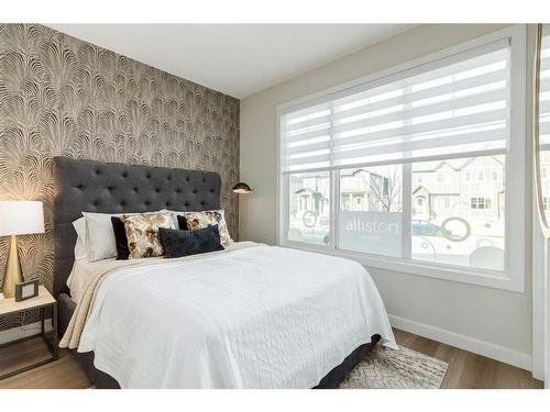 1177 Iron Landing Avenue, Crossfield, AB - Indoor Photo Showing Bedroom