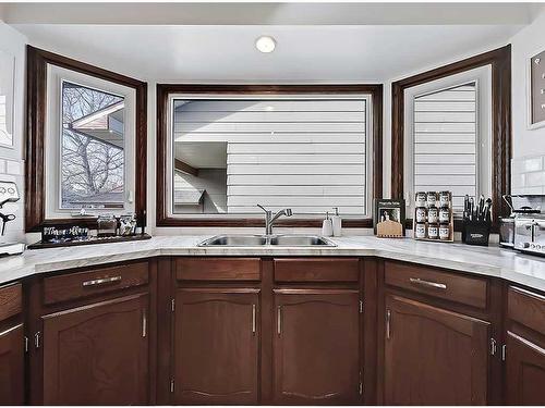 83 Berwick Crescent Nw, Calgary, AB - Indoor Photo Showing Kitchen With Double Sink