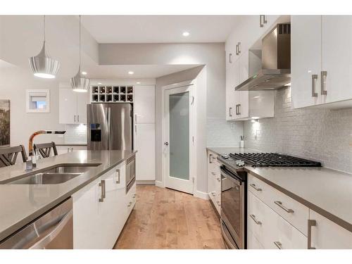 4-2432 30 Street Sw, Calgary, AB - Indoor Photo Showing Kitchen With Double Sink With Upgraded Kitchen