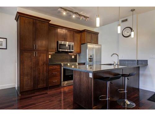 314-1321 Kensington Close Nw, Calgary, AB - Indoor Photo Showing Kitchen With Stainless Steel Kitchen With Upgraded Kitchen