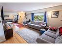 121 Holmwood Avenue Nw, Calgary, AB  - Indoor Photo Showing Living Room 